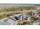 Aerial view of house and surrounding neighborhood at 3291 Pawleys N Loop, St Cloud, FL 34769