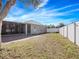 Backyard view of home with fenced area at 3291 Pawleys N Loop, St Cloud, FL 34769