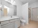 Bathroom with single vanity, toilet and shower/tub combo at 3291 Pawleys N Loop, St Cloud, FL 34769