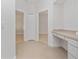 Clean hallway with tile floors and access to bedrooms and other rooms at 3291 Pawleys N Loop, St Cloud, FL 34769