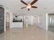 Open concept kitchen features a breakfast bar and stainless steel appliances at 3291 Pawleys N Loop, St Cloud, FL 34769