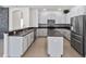 Updated kitchen featuring stainless steel appliances and an island at 3291 Pawleys N Loop, St Cloud, FL 34769