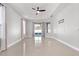 Large bedroom with multiple windows and patio access at 3291 Pawleys N Loop, St Cloud, FL 34769