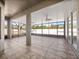 Spacious screened patio with tile floor and ceiling fan at 3291 Pawleys N Loop, St Cloud, FL 34769