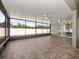 Spacious screened porch with tile flooring and ceiling fans at 3291 Pawleys N Loop, St Cloud, FL 34769