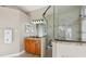 Bathroom featuring a vanity and a glass enclosed shower at 369 Belhaven Falls Dr, Ocoee, FL 34761