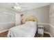 Bright bedroom with a decorative headboard at 369 Belhaven Falls Dr, Ocoee, FL 34761