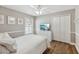 Well-lit bedroom featuring a large closet at 369 Belhaven Falls Dr, Ocoee, FL 34761