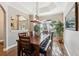 Dining room with hardwood floors, natural light, and stylish furniture at 369 Belhaven Falls Dr, Ocoee, FL 34761