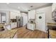 Well-lit kitchen with stainless steel appliances and granite countertops at 369 Belhaven Falls Dr, Ocoee, FL 34761