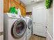 Laundry room featuring side by side washer and dryer at 369 Belhaven Falls Dr, Ocoee, FL 34761