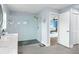 Bathroom features a glass-enclosed shower and modern fixtures at 4154 Equestrian Ln, Windermere, FL 34786