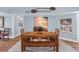 Dining room with modern decor featuring wood table with rustic benches at 4154 Equestrian Ln, Windermere, FL 34786