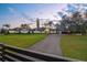 Expansive single story home featuring a circular driveway and lush, well-manicured front lawn at 4154 Equestrian Ln, Windermere, FL 34786