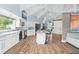 Spacious open concept kitchen features an island with seating and ample storage at 4154 Equestrian Ln, Windermere, FL 34786