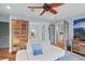Cozy living room featuring unique cabinets, French doors, and a comfortable white sofa at 4154 Equestrian Ln, Windermere, FL 34786