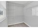 Walk-in closet with wire shelving and window at 4298 Campsite Loop, Orlando, FL 32824