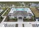 Aerial view of community pool and clubhouse at 4298 Campsite Loop, Orlando, FL 32824