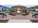 Community gazebo offering a tranquil space for relaxation and social gatherings at 4298 Campsite Loop, Orlando, FL 32824