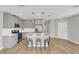Modern kitchen with stainless steel appliances and an island at 4298 Campsite Loop, Orlando, FL 32824