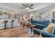 Stylish living room seamlessly connects to the kitchen and dining area at 4680 Carmel St, Orlando, FL 32808