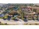 Ariel view of townhomes with community pool near highway and commercial area at 4765 Capri Pl # 209, Orlando, FL 32811