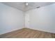 Light and bright bedroom includes a ceiling fan and a door leading to another room at 4765 Capri Pl # 209, Orlando, FL 32811