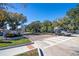 Community entrance with The Townes Of Southgate sign and Cyber Truck at 4765 Capri Pl # 209, Orlando, FL 32811