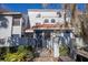 Exterior shot of the building entrance, featuring gated patio, and well-maintained yard at 4765 Capri Pl # 209, Orlando, FL 32811