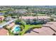 Community pool and condos near a lake at 5144 Conroy Rd # 35, Orlando, FL 32811