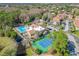 Complex featuring pool, tennis court, and playground at 5144 Conroy Rd # 35, Orlando, FL 32811