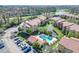 Community overview showcasing condos, pool, and parking at 5144 Conroy Rd # 35, Orlando, FL 32811