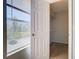 Bedroom closet with window and additional shelving at 5144 Conroy Rd # 35, Orlando, FL 32811