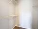Spacious walk-in closet with wire shelving at 5144 Conroy Rd # 35, Orlando, FL 32811