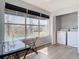 Bright laundry room with washer, dryer, and ample natural light at 5144 Conroy Rd # 35, Orlando, FL 32811