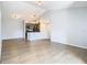 Bright and open living room with wood-look floors at 5144 Conroy Rd # 35, Orlando, FL 32811