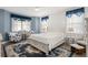 Cozy bedroom with comfortable furnishings, plenty of natural light, and a serene color scheme at 530 Sanctuary Blvd, Winter Haven, FL 33881