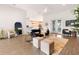 Bright and airy living room featuring a comfortable seating arrangement and modern decor at 530 Sanctuary Blvd, Winter Haven, FL 33881
