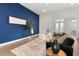 Living room featuring contemporary furnishings and an open floor plan layout at 530 Sanctuary Blvd, Winter Haven, FL 33881