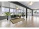 Bright sunroom with neutral color, lots of light and tile floor at 530 Sanctuary Blvd, Winter Haven, FL 33881