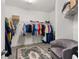 Spacious walk-in closet with organized shelving and clothing at 530 Sanctuary Blvd, Winter Haven, FL 33881