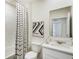 Bathroom with tub, shower, and white vanity at 5626 Paddock Fence Ln, Apopka, FL 32712