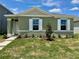 Charming single-story home with a well-maintained lawn and beautiful landscaping at 5626 Paddock Fence Ln, Apopka, FL 32712