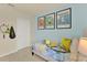 Light and airy bedroom with a twin bed and tennis theme at 5879 Galloping Dr, Apopka, FL 32712