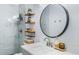 Modern bathroom with a large mirror, floating shelves, and a walk-in shower at 625 Greencove Ter # 123, Altamonte Springs, FL 32714