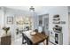 Dining area with wood table and access to patio at 625 Greencove Ter # 123, Altamonte Springs, FL 32714