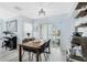 Dining area with wood table and sliding glass doors at 625 Greencove Ter # 123, Altamonte Springs, FL 32714