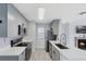 Modern gray kitchen with stainless steel appliances at 625 Greencove Ter # 123, Altamonte Springs, FL 32714