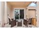 Relaxing patio with wicker chairs and a glass sliding door leading inside at 625 Greencove Ter # 123, Altamonte Springs, FL 32714