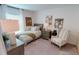 Cozy bedroom with a double bed and plenty of natural light at 649 E Howry Ave, Deland, FL 32724